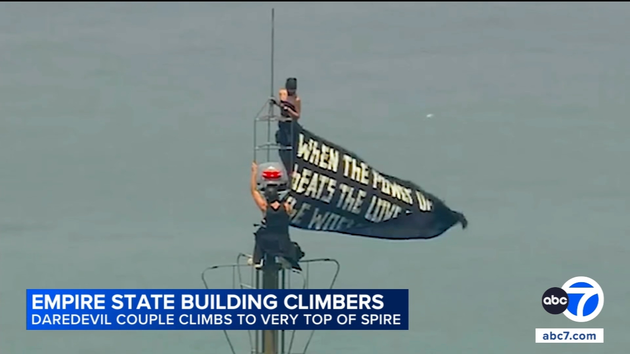 Daredevil couple ID'd after being arrested for brazen climb to top of Empire State Building