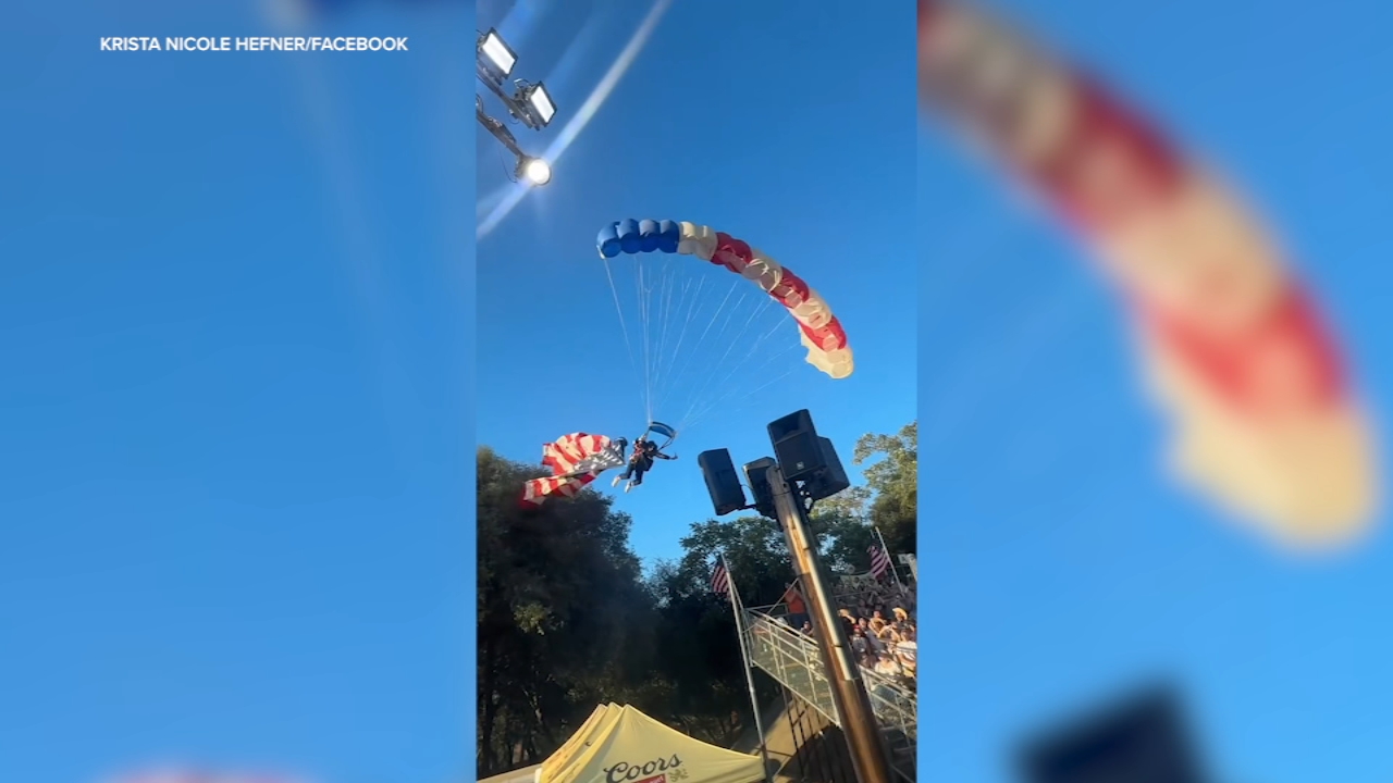 Skydiver carrying American flag crashes into tent after flag snags tree at NorCal rodeo
